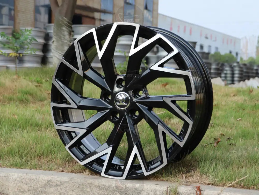 Llantas Deportivas Estilo Volkswagen con Diseño Turbina Angular – Negro y Plata