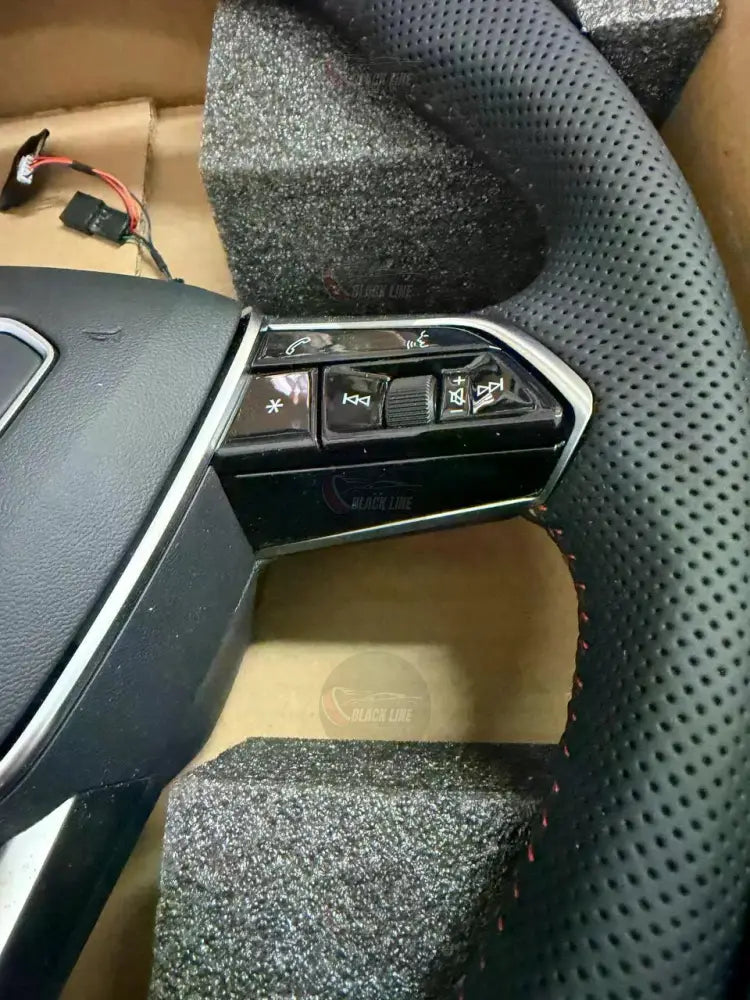 Volante Audi RS en Cuero Negro Perforado con Levas Multifunción y Detalles RS