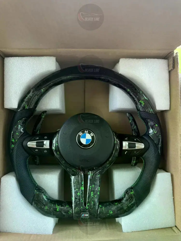 Volante BMW M Personalizado en Carbono Negro con Detalles Verdes Levas M1/M2 y Multifunción