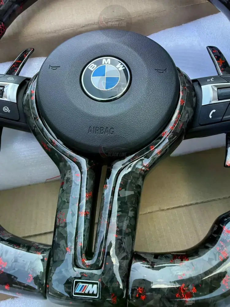 Volante BMW M Performance en Acabado Carbono Negro con Detalles Rojos Levas M1/M2 y Multifunción
