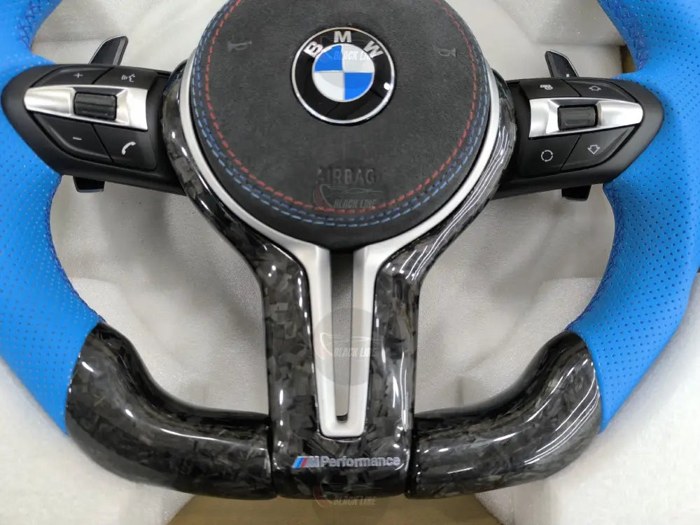 Volante BMW M Performance Deportivo en Carbono Forjado y Piel Azul | Levas de Cambio Fondo Plano Mandos Multifunción y