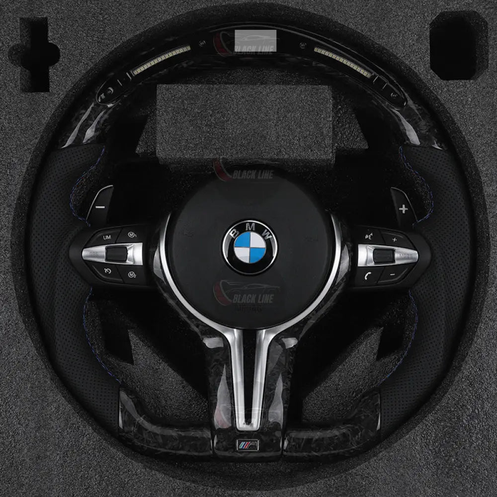 Volante BMW M Performance en Fibra de Carbono y Alcantara con Race Display Levas y M1/M2