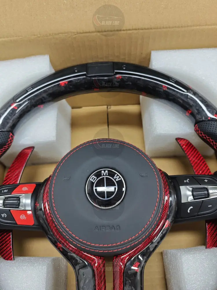 Volante BMW M Sport en Cuero Negro con Levas Multifunción y Acabado Plateado