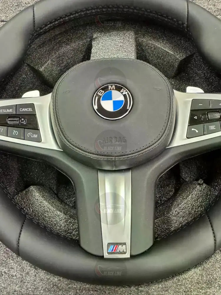 Volante BMW M Sport en Cuero Negro con Levas Multifunción y Acabado Plateado