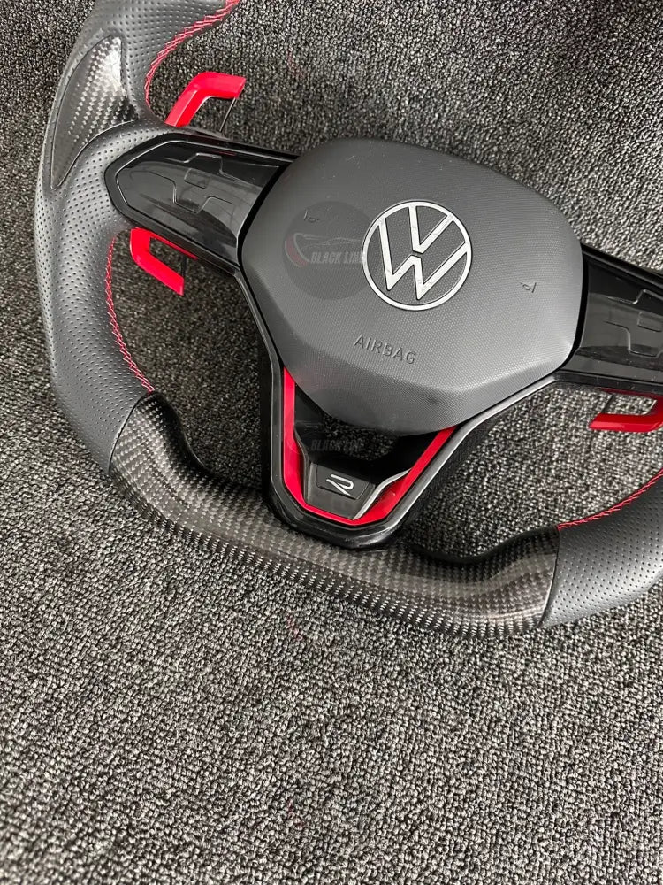 Volante Deportivo Volkswagen R de Carbono y Cuero Perforado con Costura Roja Levas Ampliadas y Airbag Incluido