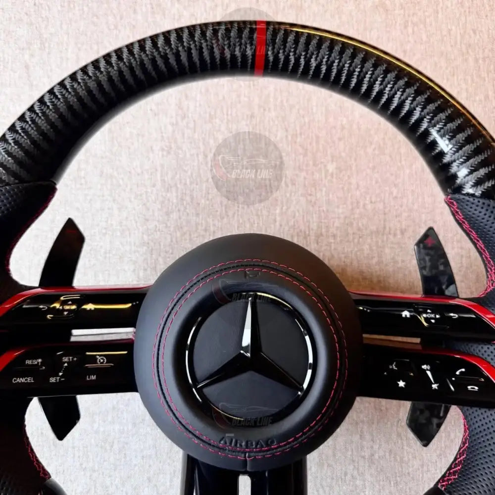 Volante Mercedes-AMG Carbono | Cuero Perforado Costuras Rojas y Levas de Carbono
