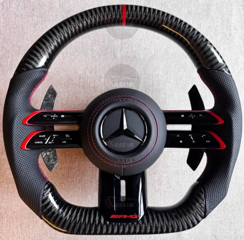 Volante Mercedes-AMG Carbono | Cuero Perforado Costuras Rojas y Levas de Carbono