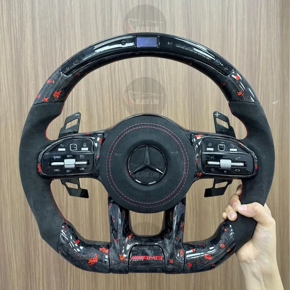 Volante Mercedes-AMG Performance en Carbono Negro con Detalles Rojos Microfibra Pantalla LED Levas y Multifunción