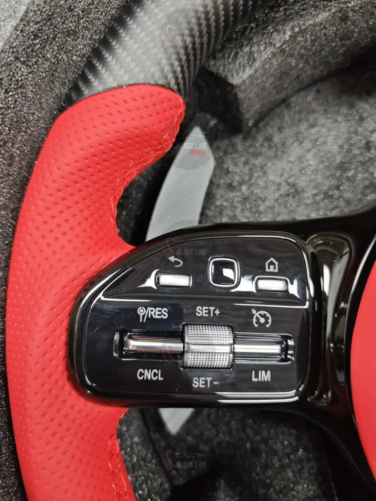 Volante Mercedes-AMG Performance en Fibra de Carbono Cuero Rojo Perforado y Levas