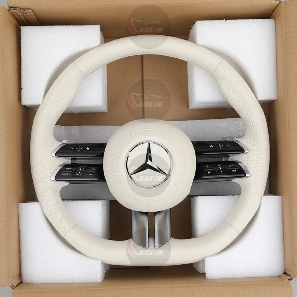 Volante Mercedes-Benz en Cuero Beige Perforado con Levas Multifunción y Acabado Negro Brillante