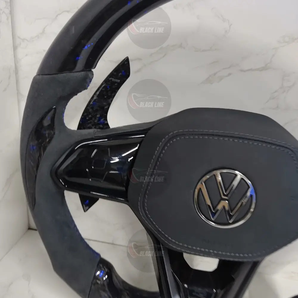 Volante Volkswagen R Deportivo en Carbono Forjado con Detalles Azules y Alcántara Gris | Levas de Carbono Mandos